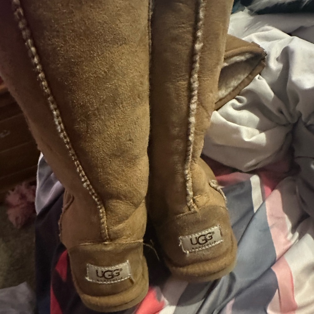 Size 4 tall uggs foot keeps growing quickly